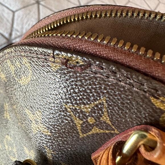 Authentic Louis Vuitton Monogram Alma satchel - Picture 8 of 13